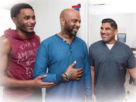 Male couple with healthcare worker
